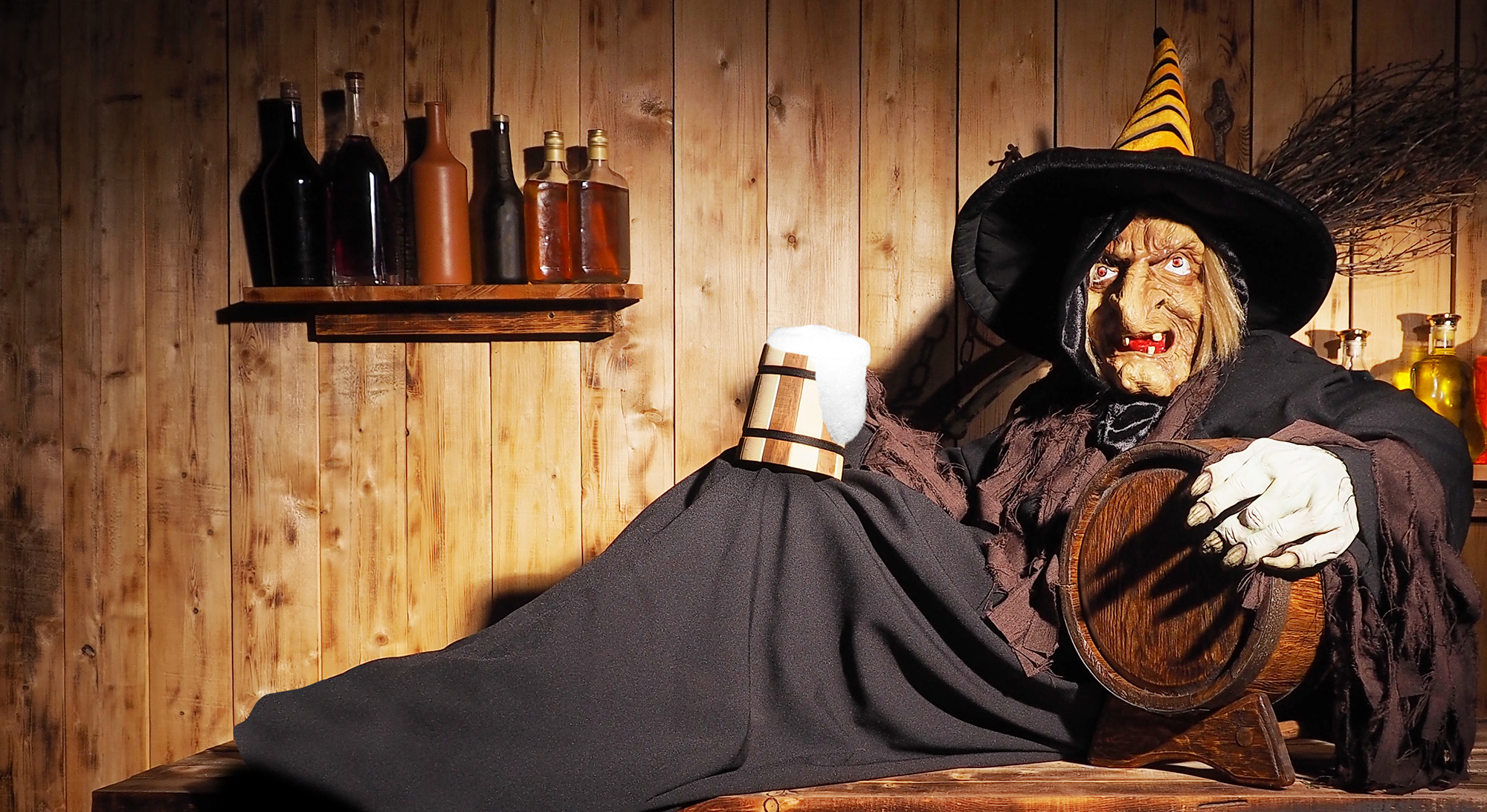 Witch with a beer and a barrel 